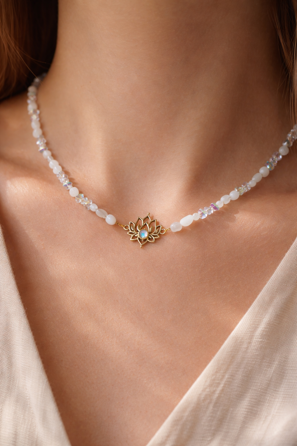 Moonstone necklace with lotus charm