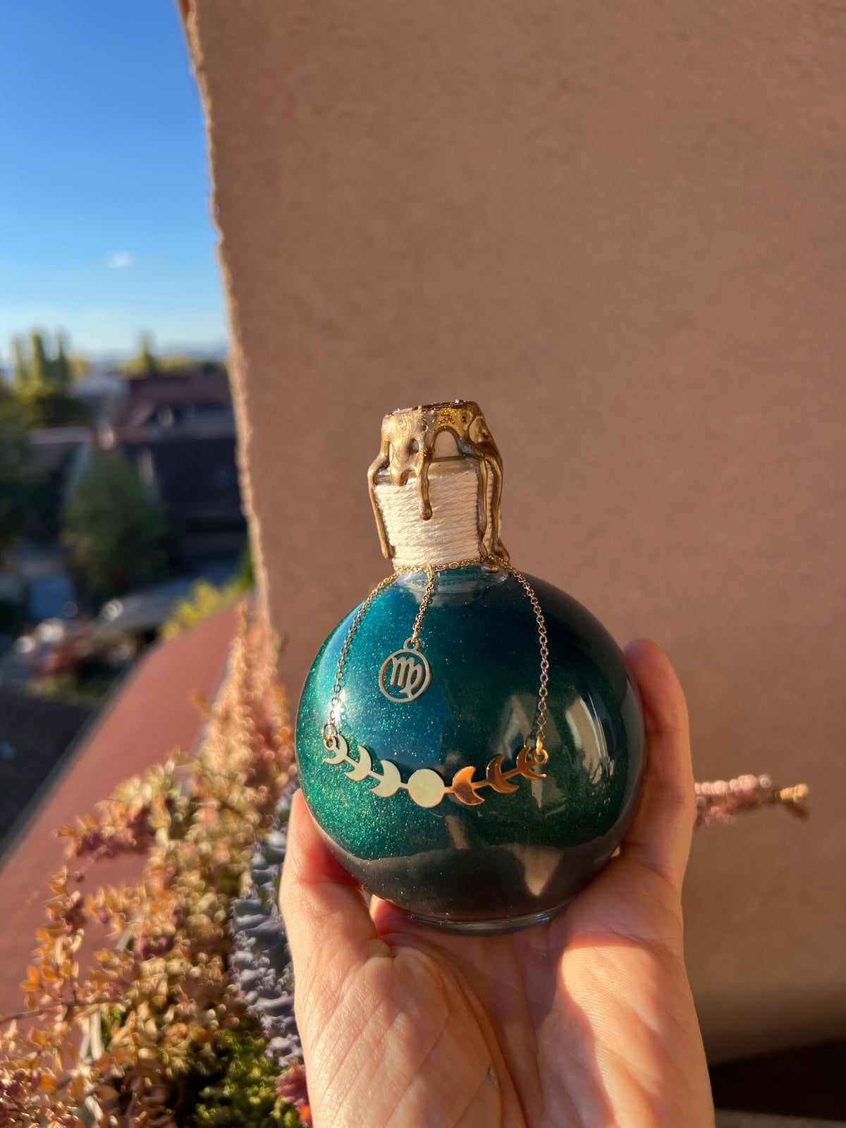 Magic potion decoration with Zodiac charm