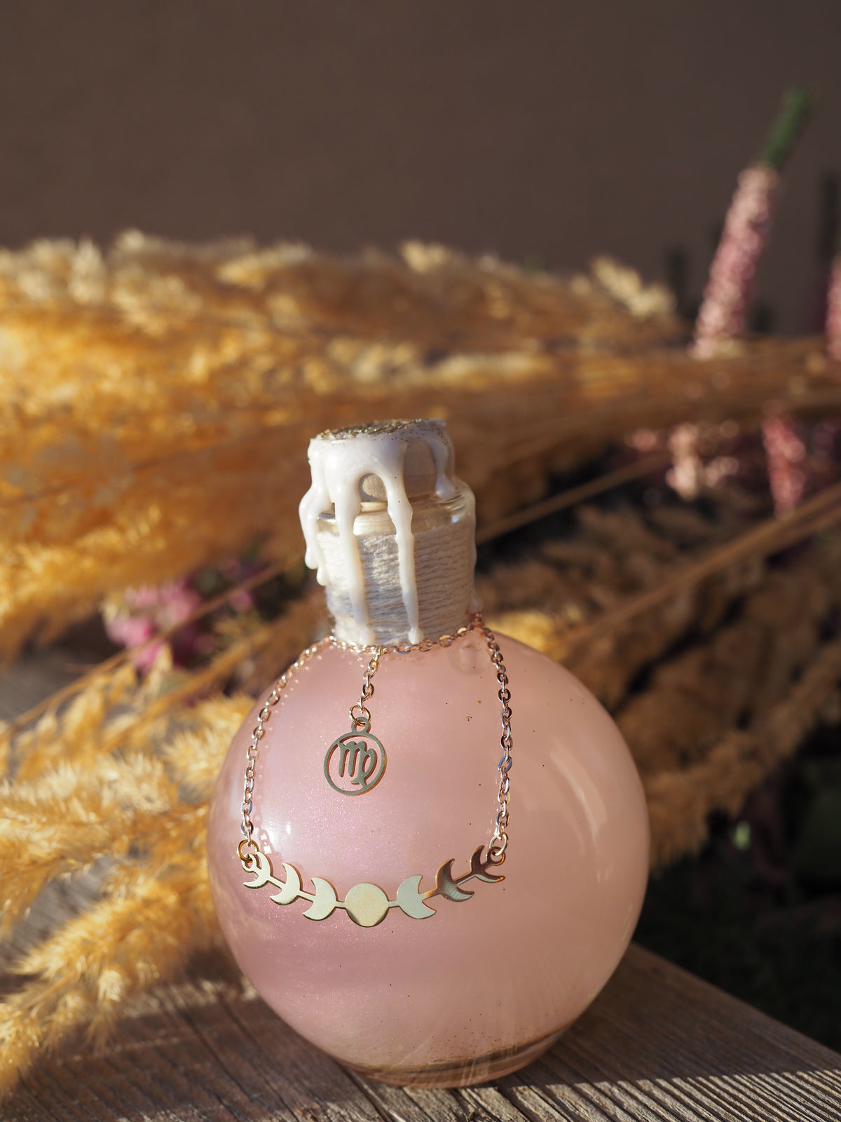 Magic potion decoration with Zodiac charm