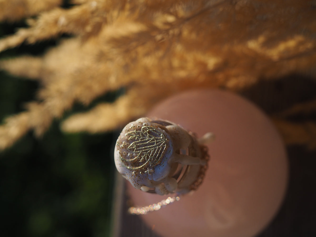 Magic potion decoration with Zodiac charm