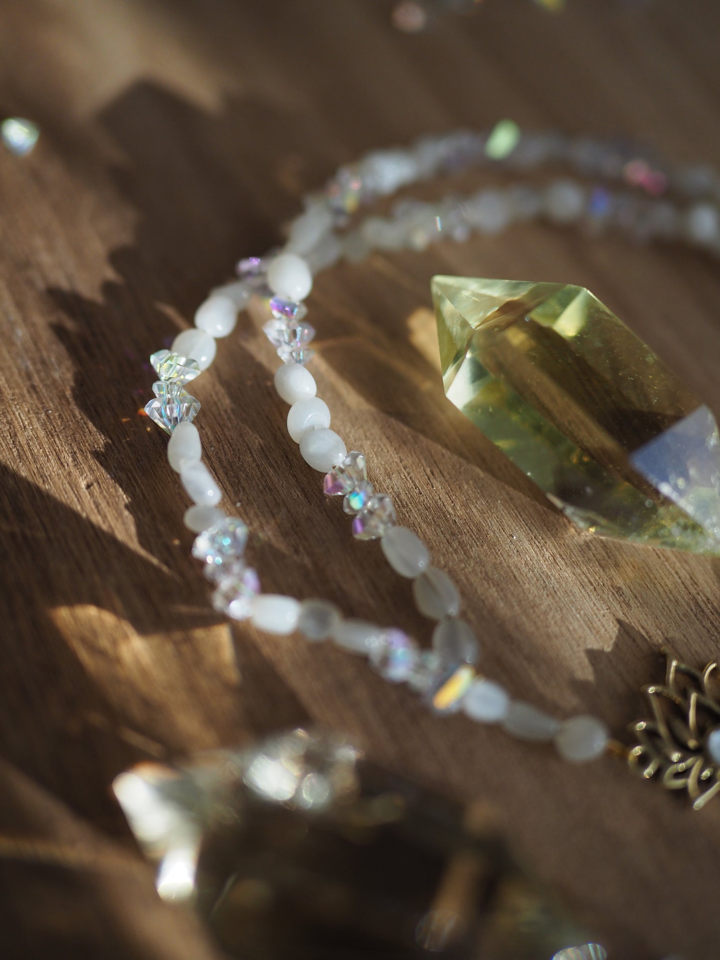 Moonstone necklace with lotus charm