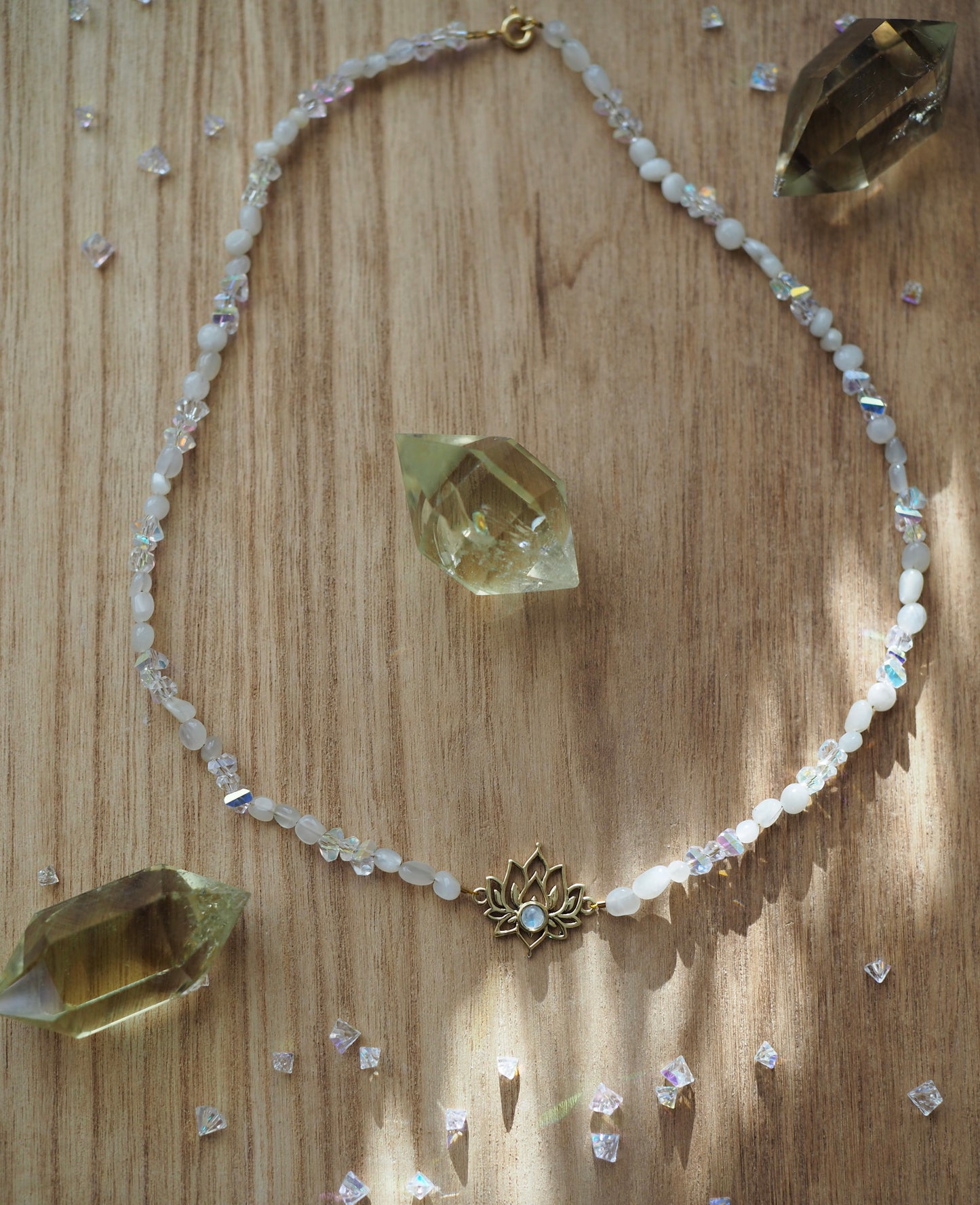 Moonstone necklace with lotus charm