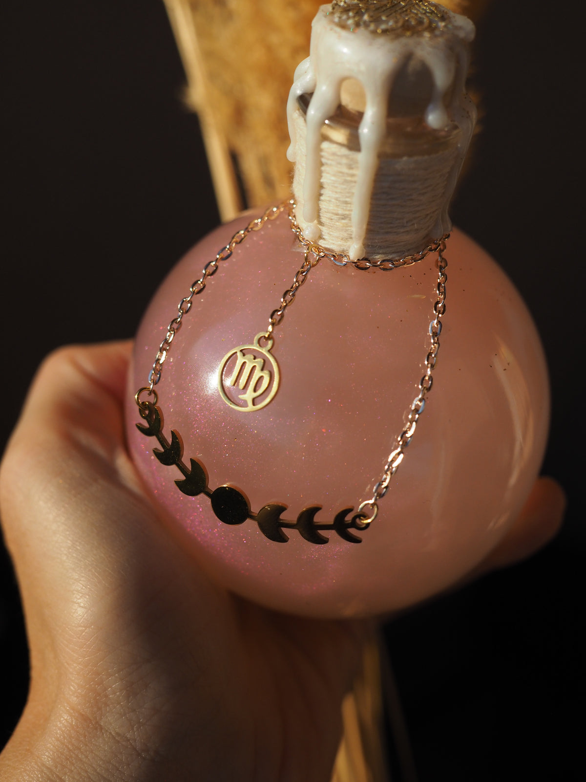 Magic potion decoration with Zodiac charm
