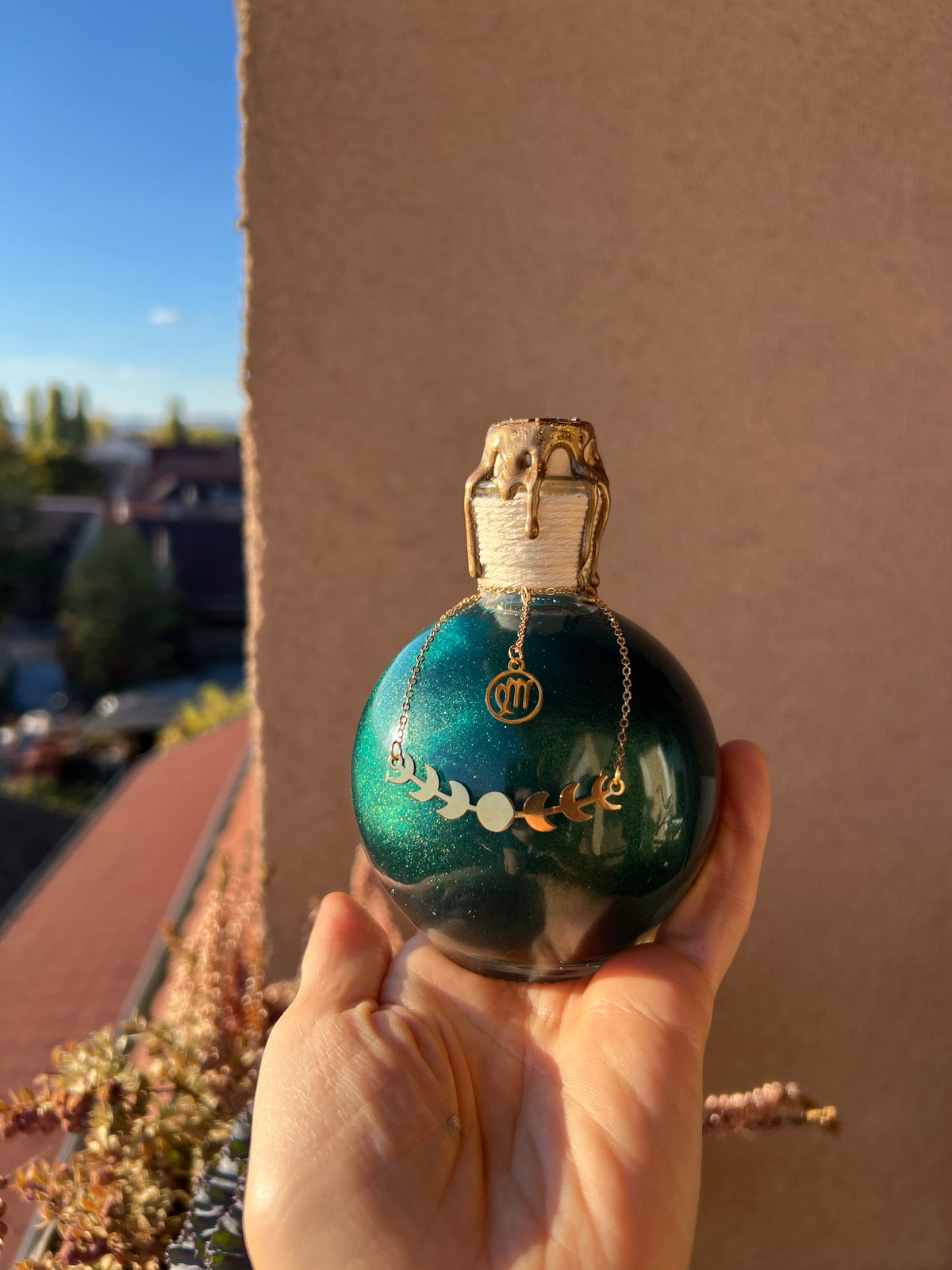 Magic potion decoration with Zodiac charm
