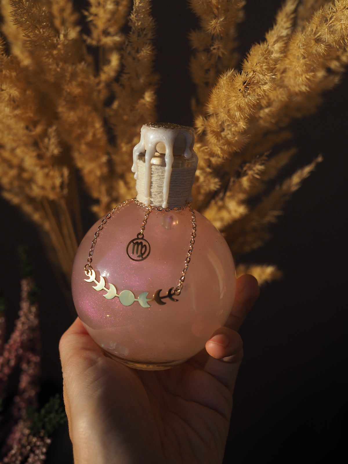 Magic potion decoration with Zodiac charm