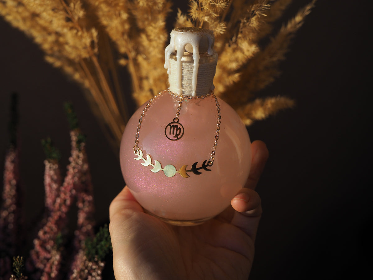 Magic potion decoration with Zodiac charm