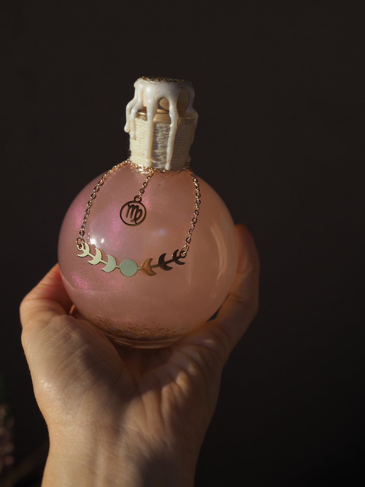Magic potion decoration with Zodiac charm