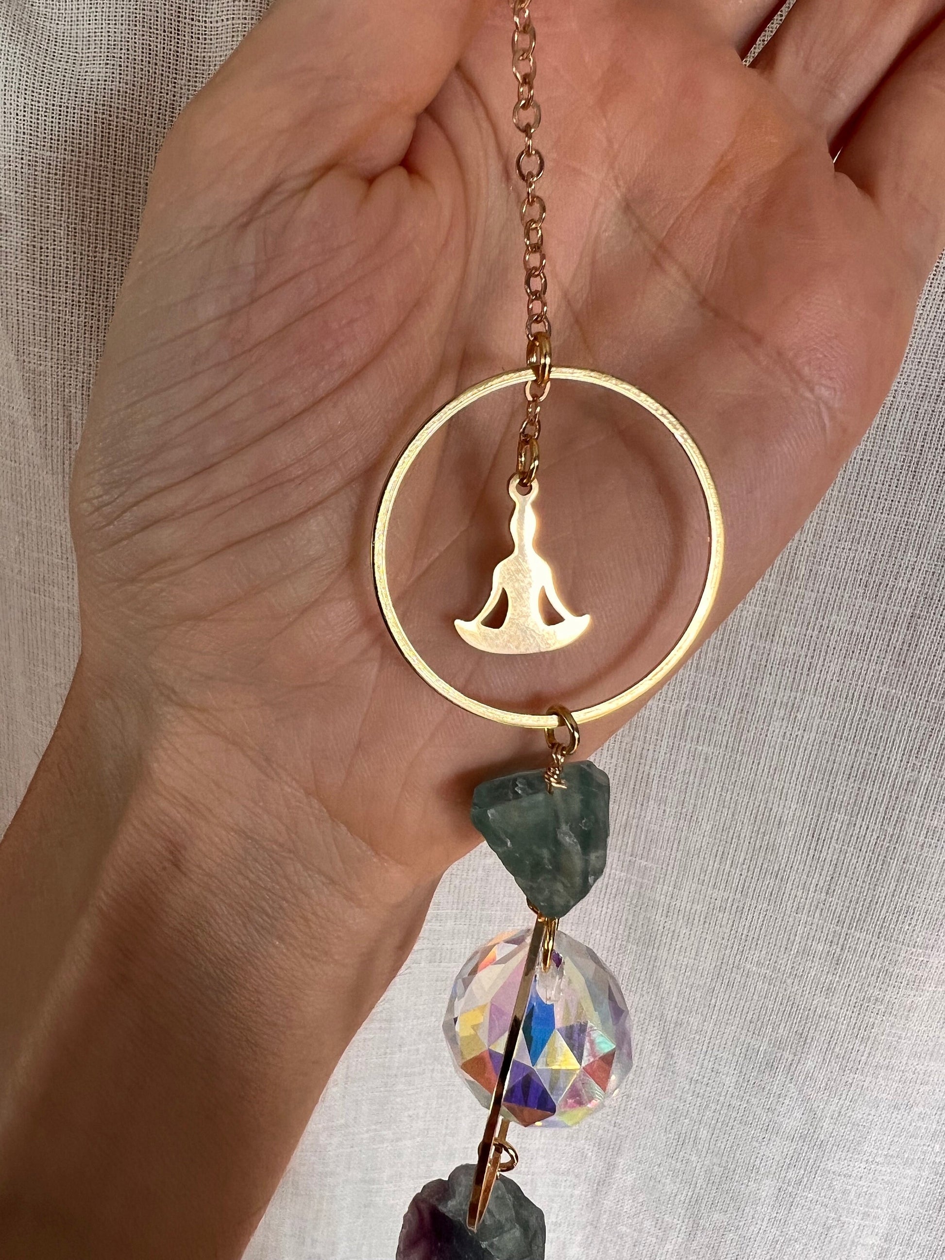 Fluorite crystal gold plated suncatcher with joga and zodiac pendants